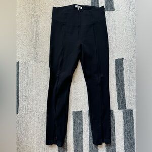 Good American ponte pant with front ankle zips and a side zipper.